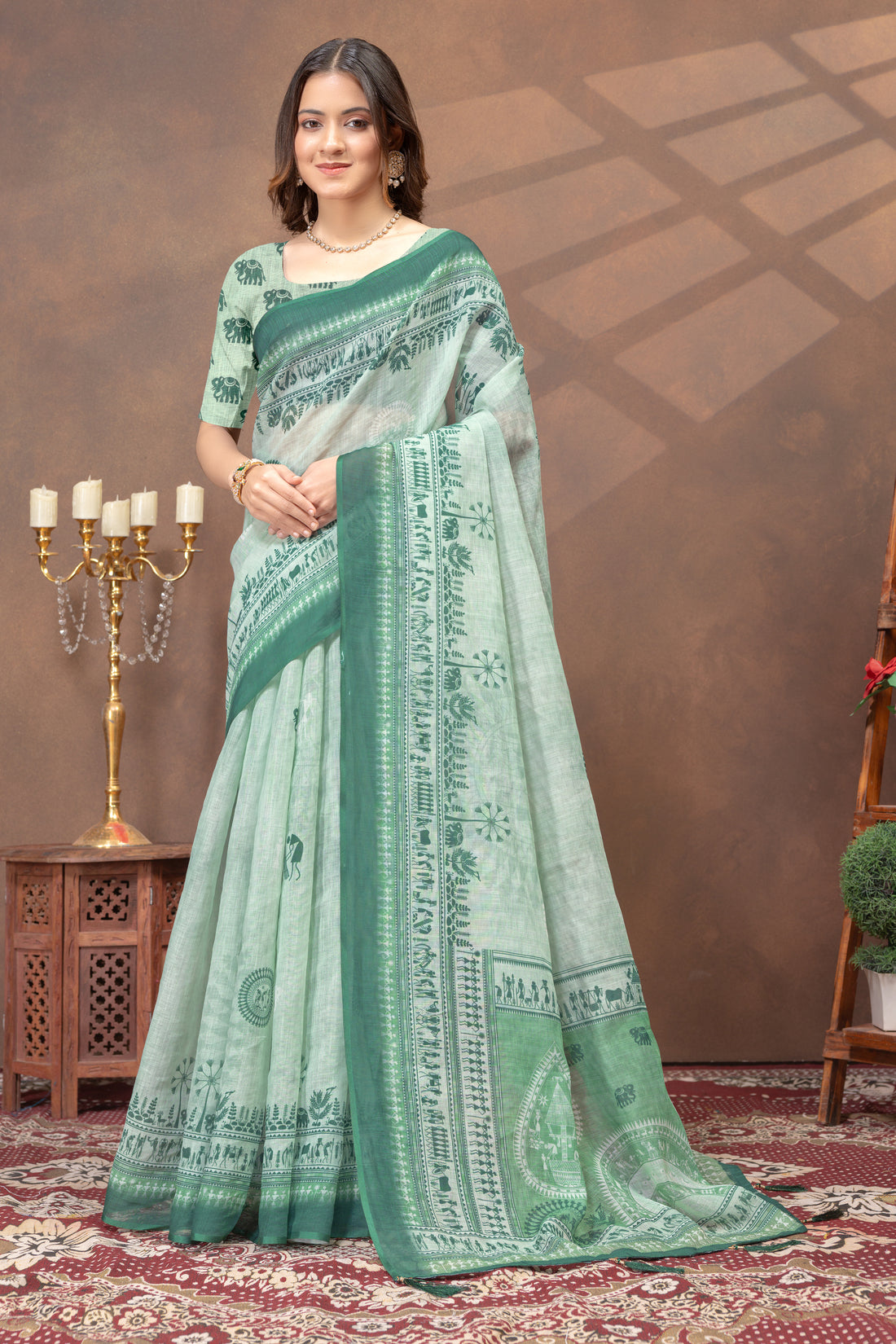Pastel Green Folk Print Saree with Traditional Woven Border for Women