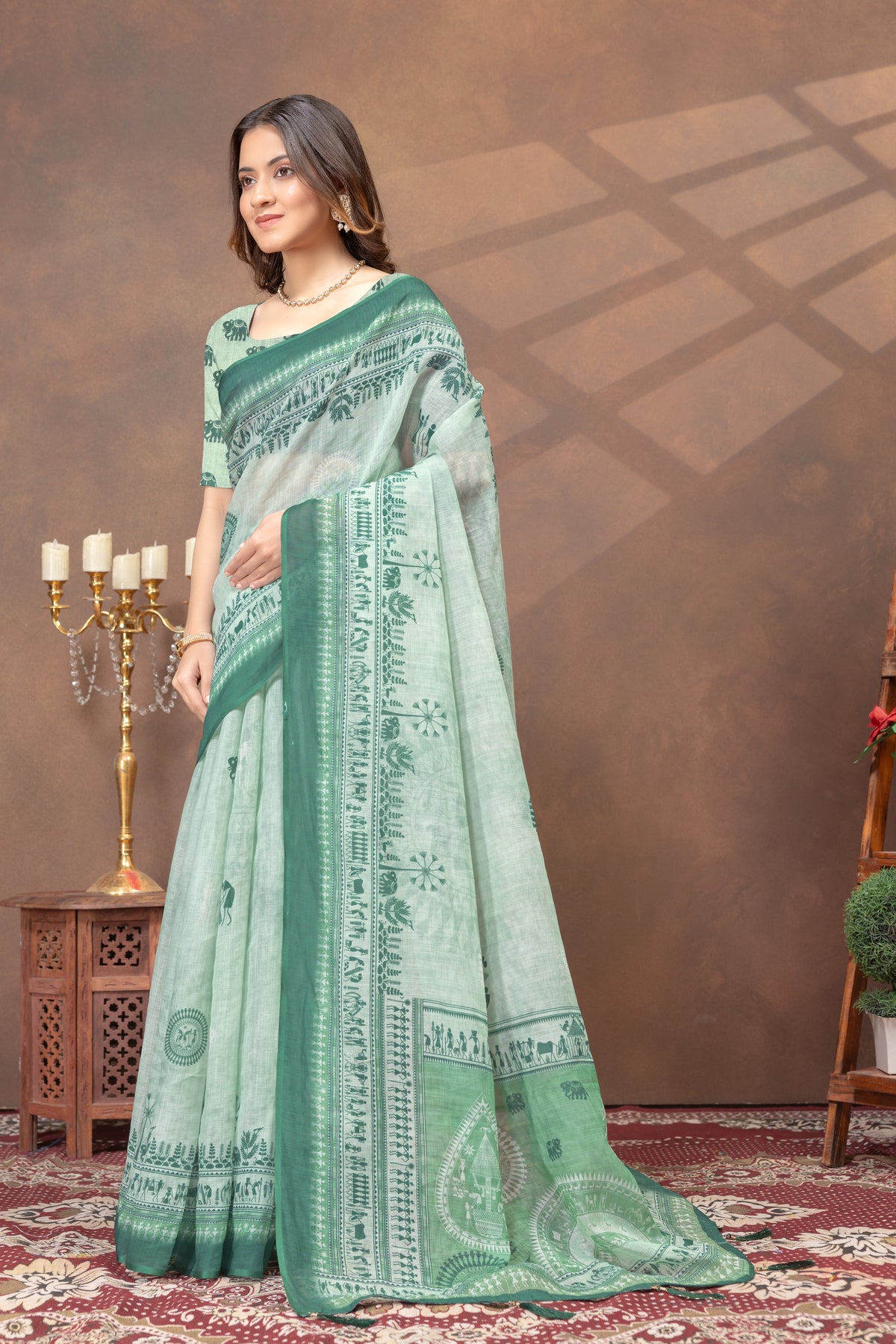 Pastel Green Folk Print Saree with Traditional Woven Border for Women