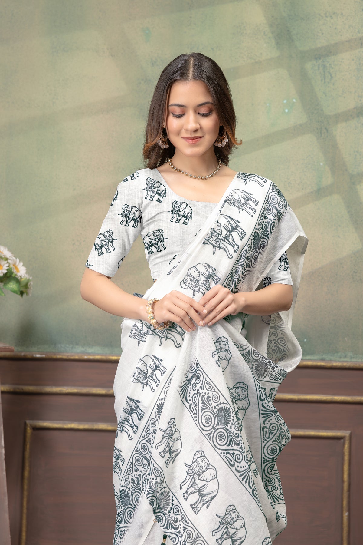 Ivory Linen Cotton Saree with Elephant Print Border Now for Women