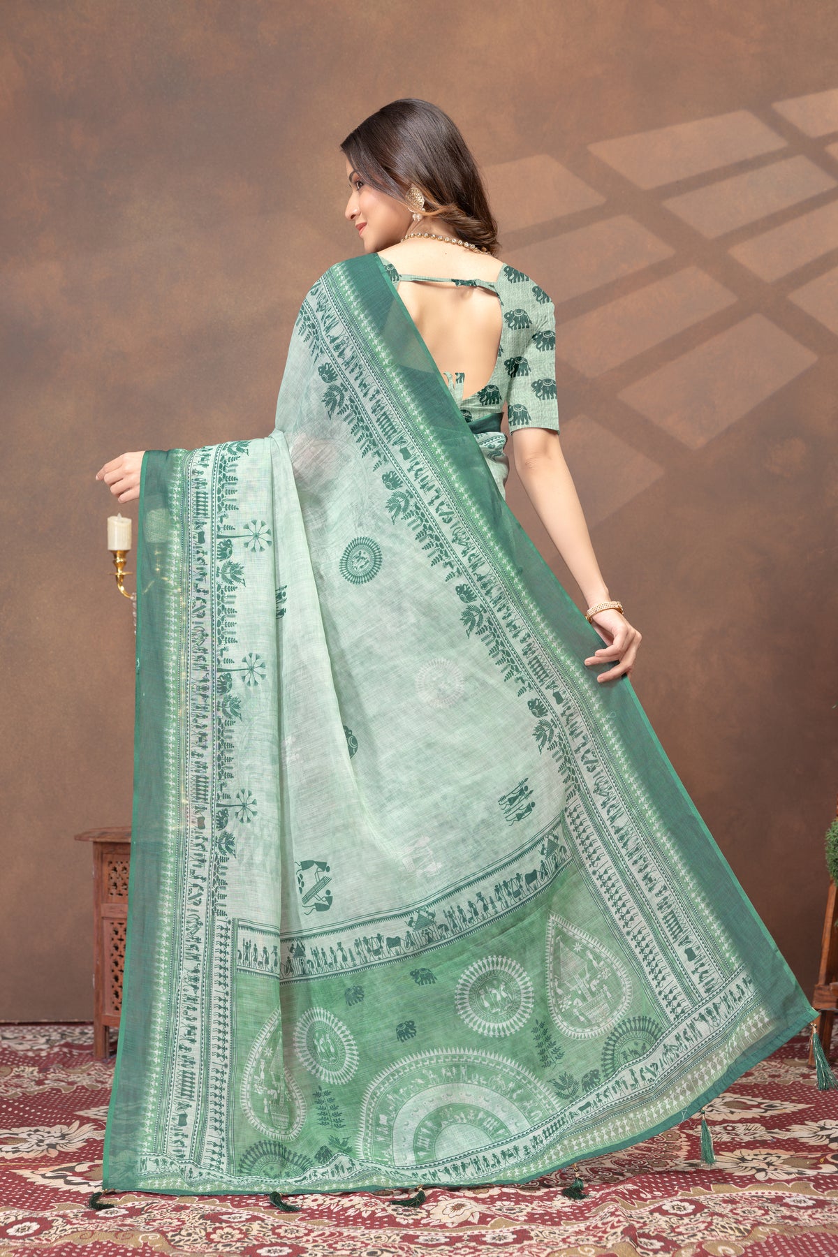 Pastel Green Folk Print Saree with Traditional Woven Border for Women