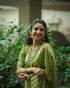 Festive Green Banarasi Saree with Subtle Zari Motifs for Women