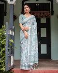 Pastel Green Linen Saree with Elegant Floral Print