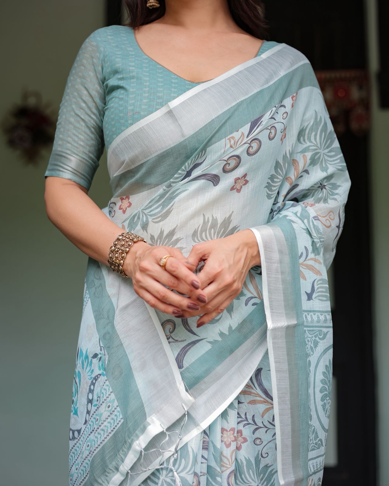 Pastel Green Pure Linen Printed Saree with Tassels