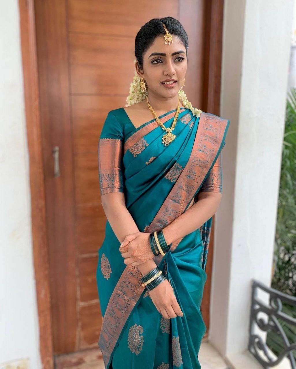 Festive Teal Banarasi Saree with Traditional Motifs for Women