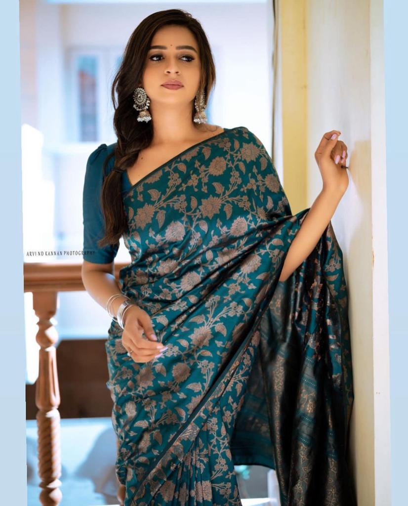 Elegant Teal Silk Saree with Floral Zari Design for Women
