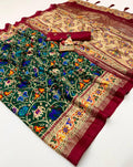 Traditional Bottle Green Patola Border Silk Saree