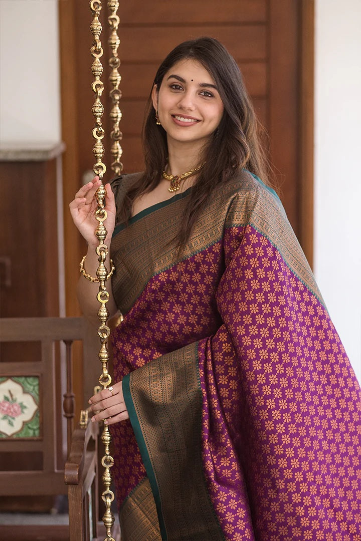 Traditional Purple Saree with Rich Green Border Design