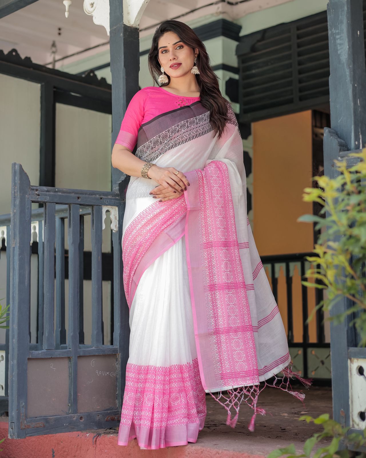 Elegant White Linen Saree with Bold Pink Designer Border